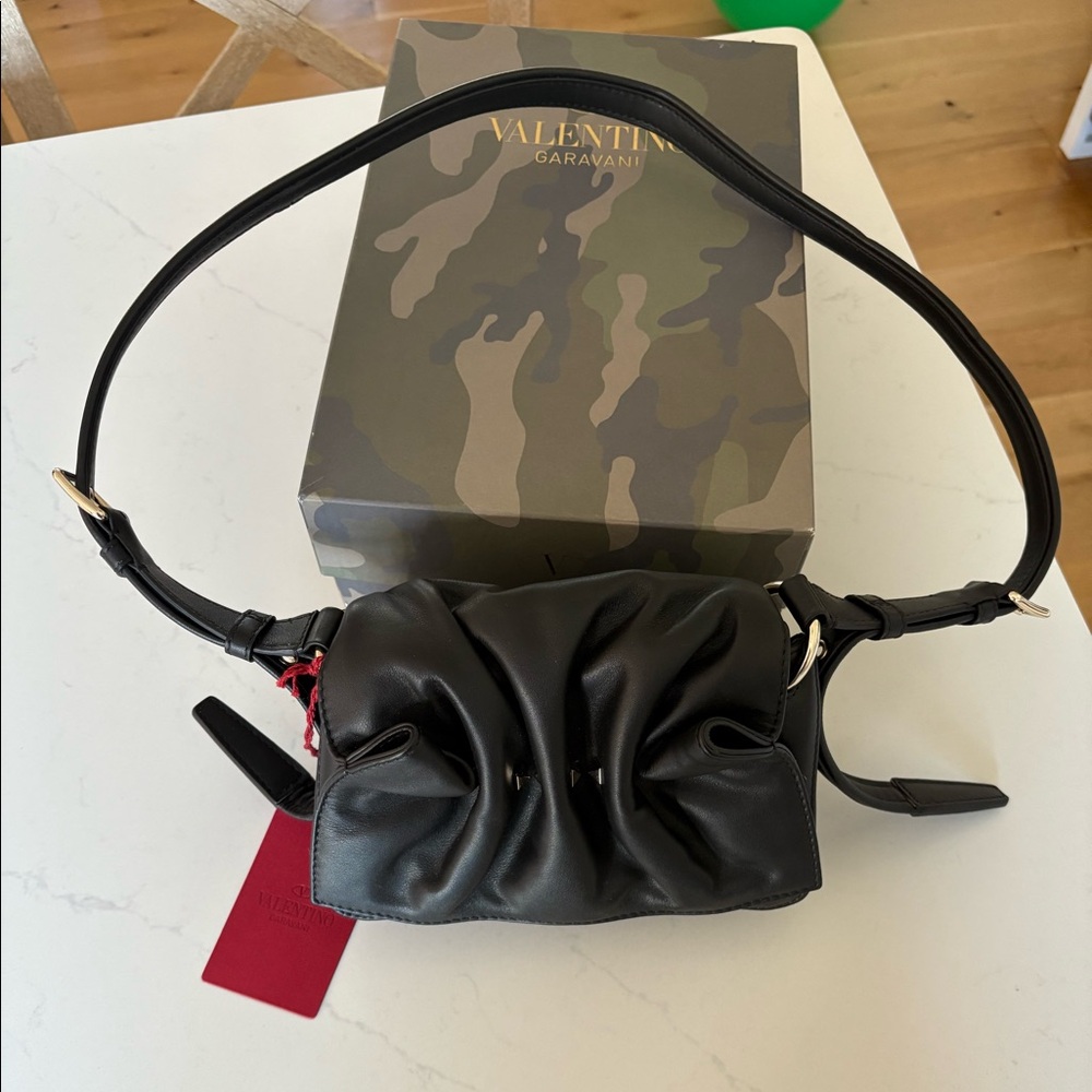 Brand new unused Valentino small shoulder bag. Black rockstud leather
